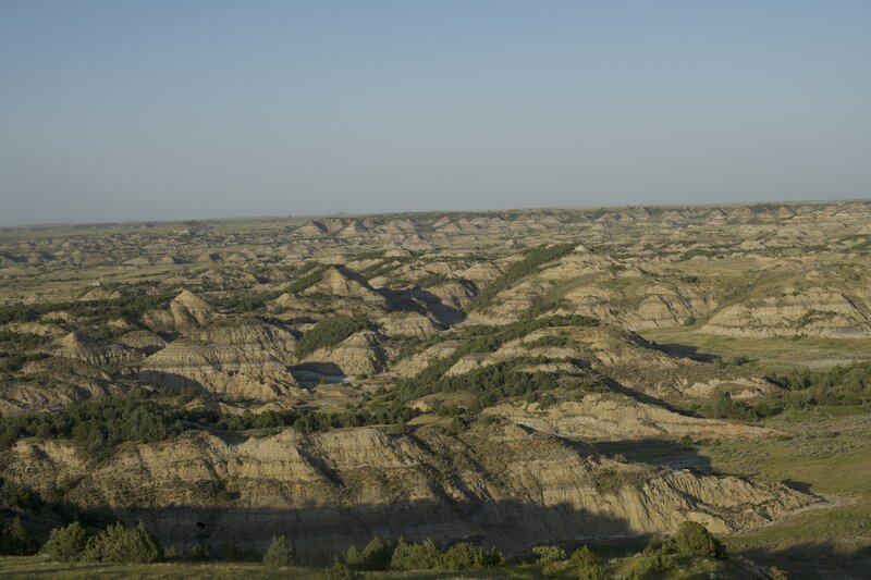 The badlands spread out before you at Buck Hill. The views seem to be endless, and you might find yourself alone on the hilltop in the evening where you can be quiet and hear the wind blowing through the landscape.