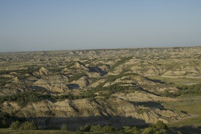 The badlands spread out before you at Buck Hill. The views seem to be endless, and you might find yourself alone on the hilltop in the evening where you can be quiet and hear the wind blowing through the landscape.