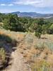 Edge of Lake Nighthorse peeking above the foothills to the south,