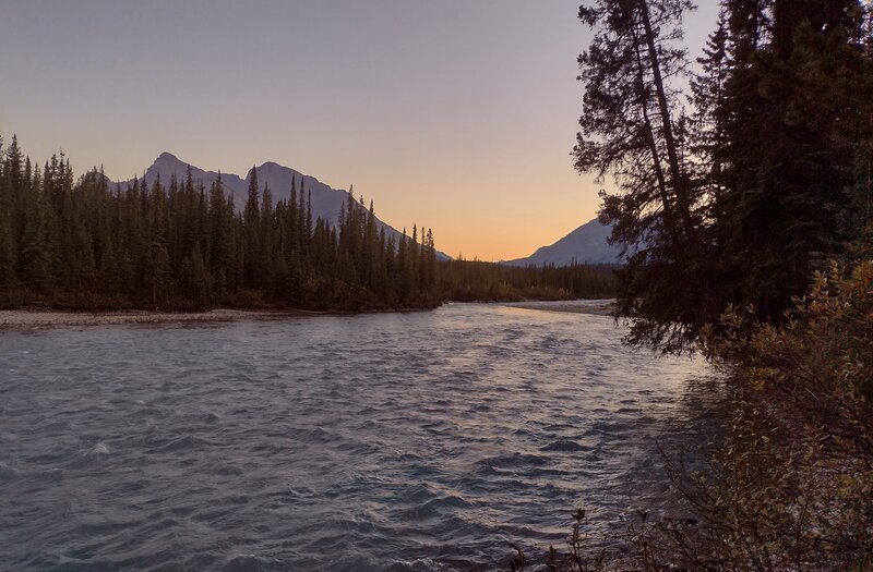 Sunset from the banks of the Snake Indian River at Wellbourne trail camp.