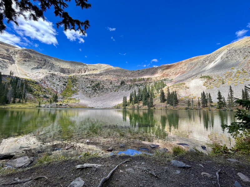 Reflection on Mill Lake with Fossil Mountain in the background.