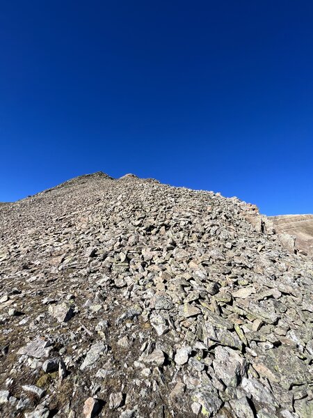 The rocky slope before the summit.