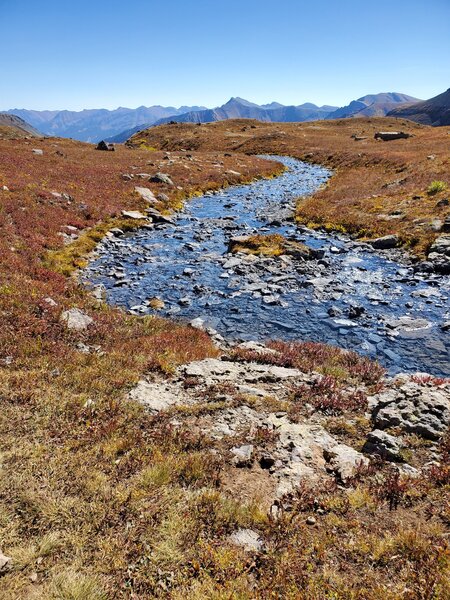 Ice Lake outflow stream curves through the fields.