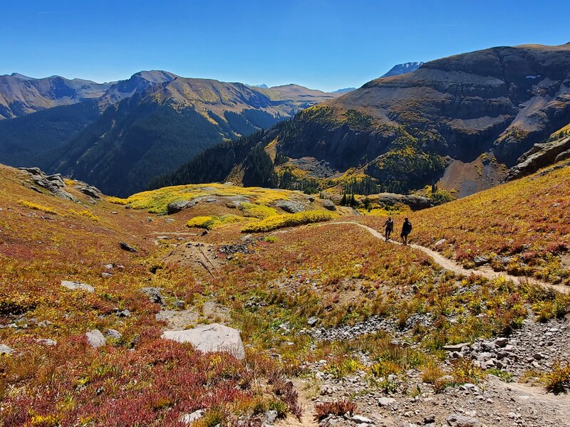 Descending though fall colored scrub.