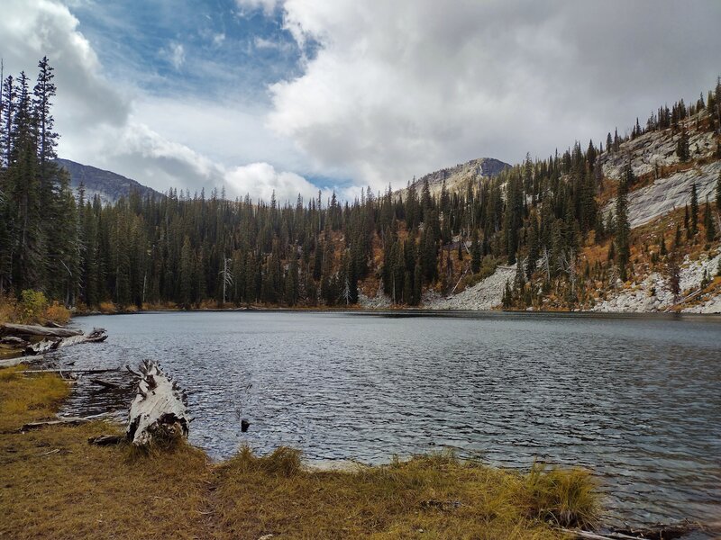 The second/middle Roman Nose Lake. Roman Nose Peak (left) and an unnamed peak (right center) rise up behind the lake. Looking southwest from the lake's outlet.