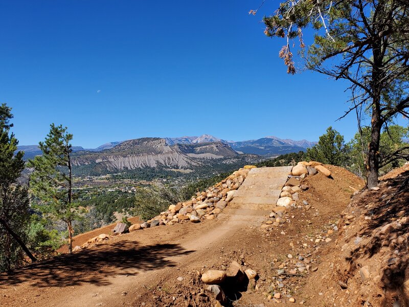 Typical jump with Smelter and Perrins Peak in the distance.