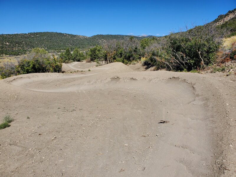 Fun serpentine feature near the bottom of this downhill trail.