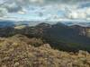 Pend Oreille Divide Trail continues north along the ridge by dome topped Mt. Willard (center), then around unnamed pointy peak (center right), followed by Mt. Purdy that's hidden behind Mt, Williard. Forested South Callahan Creek drainage below (right).