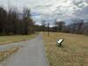 Along the paved trail, wooden panels have illustrations and text from Owl Moon, a children's book by Jane Yolen.