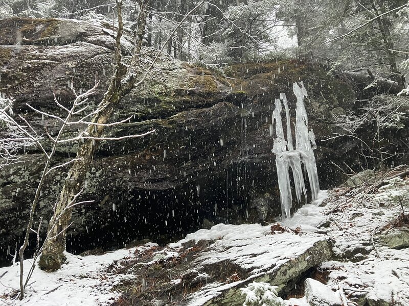 Snowy cave, on the hillside of Round Mountain.