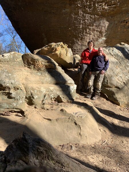 The two adventurers below Grays Arch with an example of hard iron layer of Leisegang Banding in the foreground.