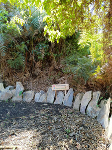Stone  beside the trail in a turn.