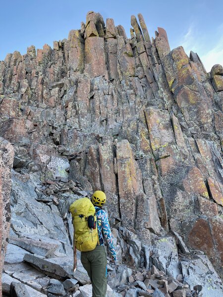 Looking up at the wall to climb before the summit.