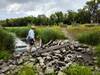 Crossing Sand Creek during low water in late summer.