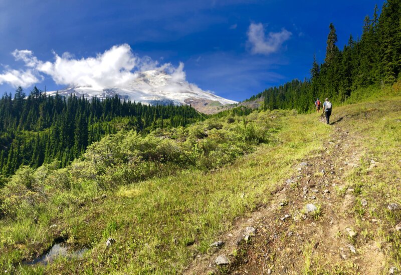 Hikers approaching Mount Baker.