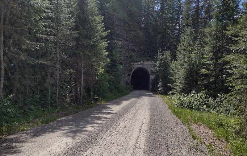 Tunnel ahead, one of several tunnels along The Hiawatha Trail, an old railroad route.