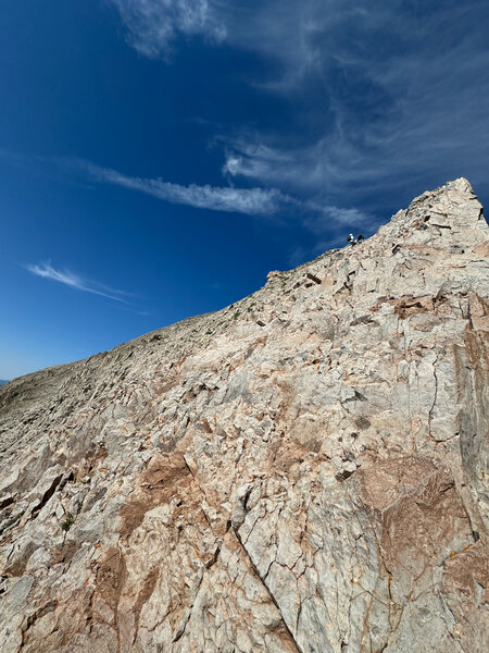 The face after exiting the chimney. Sticking far right next to the chimney yields the best rock and least exposure.