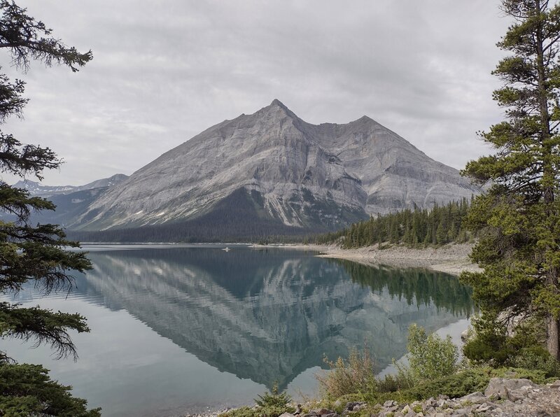 Mount Lyautey, 9,990 ft., and its reflection in the calm waters of Upper Kananaskis Lake.