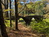 The trail goes by the Stone Arch bridge which crosses the creek in the park.