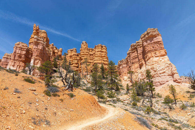 Approaching a set of towering hoodoos.