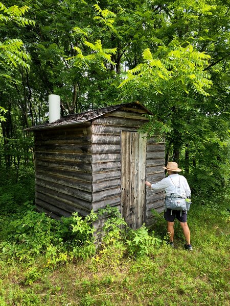 The vault toilet near the Box Elder Trail junction.