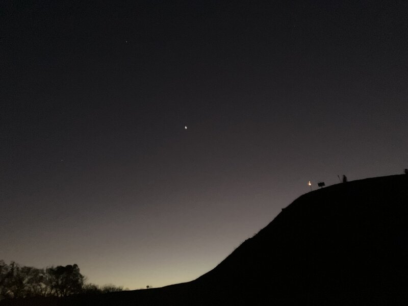 The silhouette of Mound A, as the sun sets.