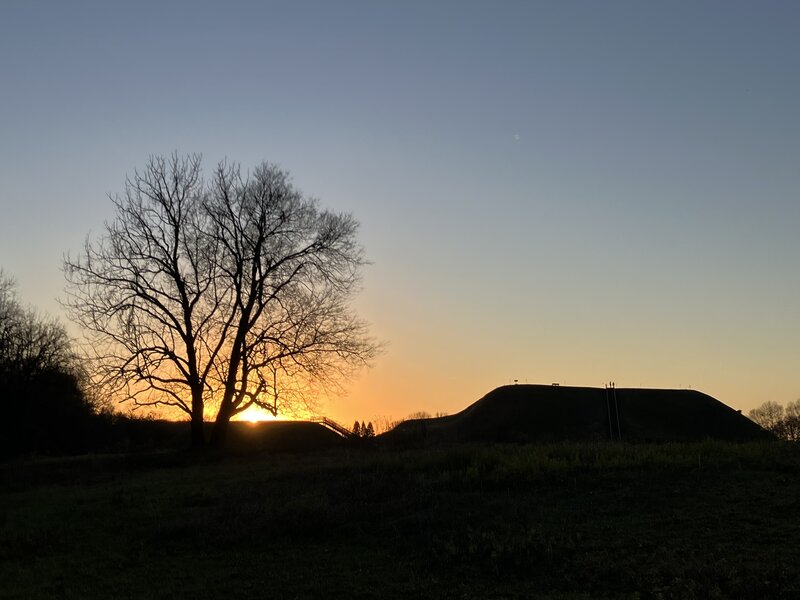 The sun setting at the Etowah Indian Mounds.