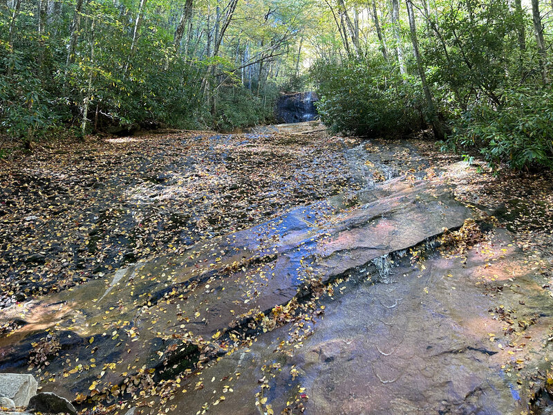 Unique waterfall that runs across the surface of the bedrock.