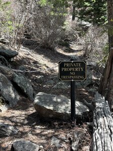Trail ends at the Broadmoor property line, about .1 of a mile from the end of the route as shown.