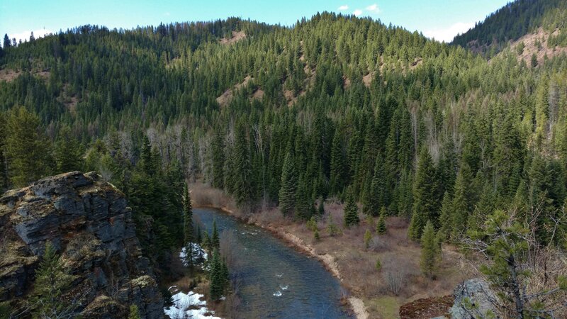 The Coeur D'Alene River is far below the trail at this rocky overlook.