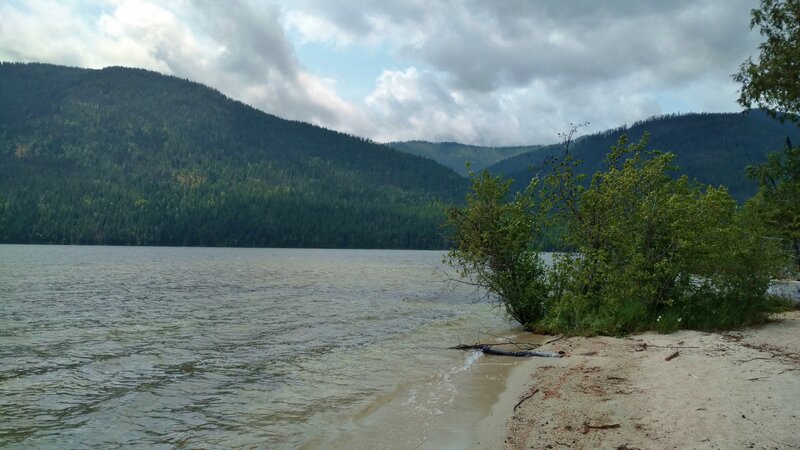 The sandy beach (bottom right) at Trapper trail camp, is a great place to take in the views across Upper Priest Lake to Plowboy Mountain (upper left).