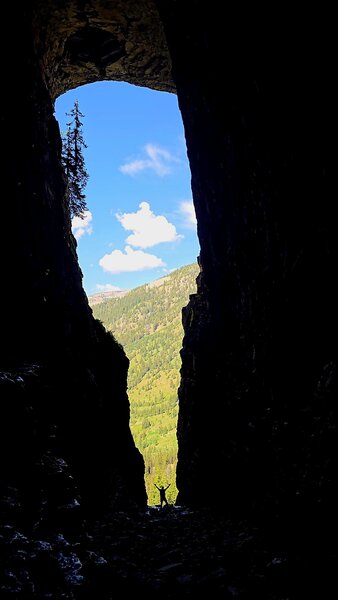 Looking outside from inside the cave at Darby Canyon Wind Cave.