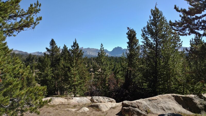 About nine miles from the Scab Creek trailhead, mountains of the Continental Divide, emerge in the distance to the east.