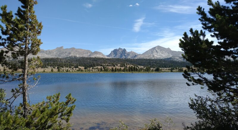 Dream Lake. In the distance, Pronghorn Peak, 12,388 ft., (left pointy peak), Mount Bonneville, 12,585 ft., (center), and Raid Peak, 12,532 ft., (right center).