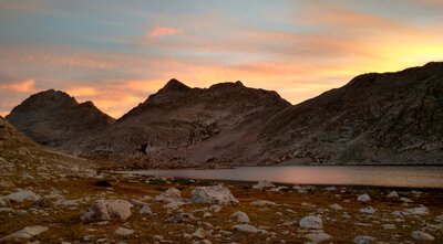 Sunrise at Bewmark Lake. Odyssey Peak, 12,062 ft. (center) on the Continental Divide.