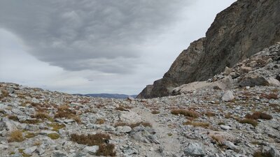 Approaching Photo Pass from the west side of the Continental Divide. The cairn is on the large boulder to the right.