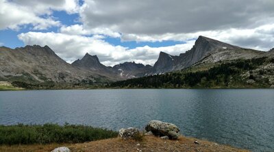 Middle Fork Lake. In the distance (left to right) are an unnamed peak (11,710 ft.), Nylon Peak (12,392 ft.), Mount Bonneville (12,585 ft.), Pronghorn Peak (12.388 ft.), and Dragon Head Peak (12,205 ft.).