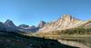 (left to right) Nylon Peak, Mount Bonneville, Pronghorn Peak, and Dragon Head Peak in the early morning sunlight, along with Middle Fork Lake and its surrounding meadows.