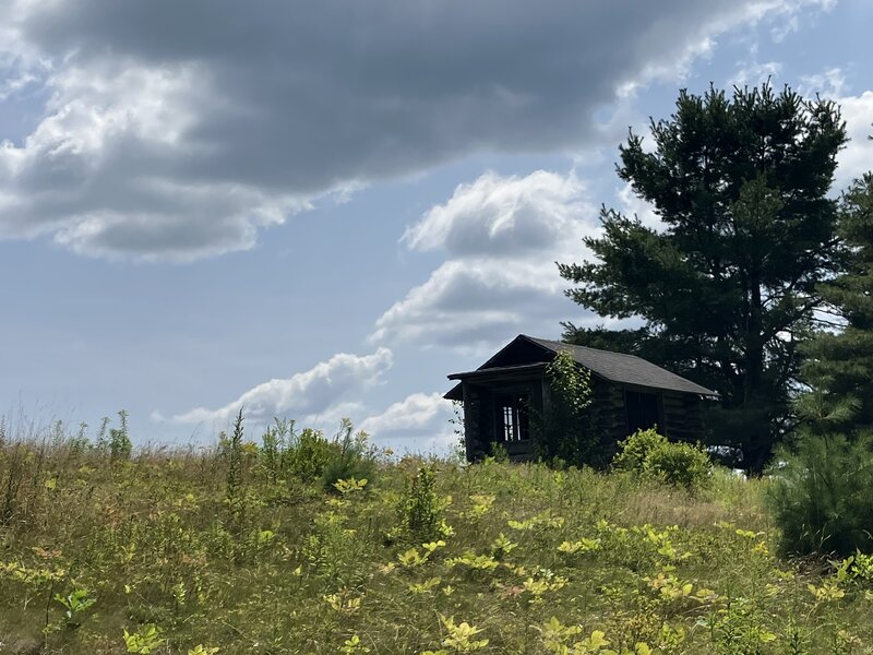 A privately-owned cabin on top of the hill.