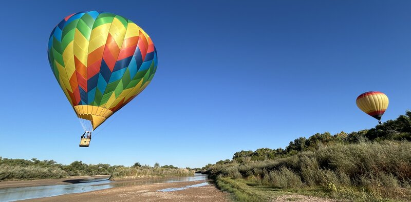 Balloons cruising the Rio - very low water