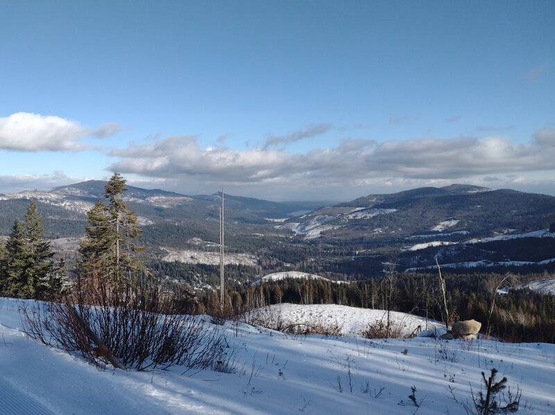 Mountains into the distance, looking east-northeast from Tripp's Knob. Spirit Lake (center) is also below in the distance.