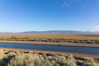The California Aqueduct with the Tehachapi Mountains in the distance.