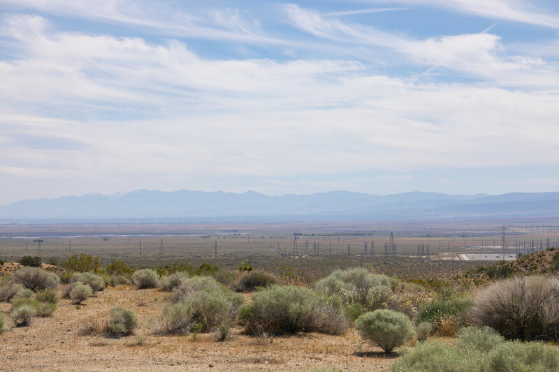 Cirrus clouds above Antelope Valley, the San Gabriel Mountains in the distance.