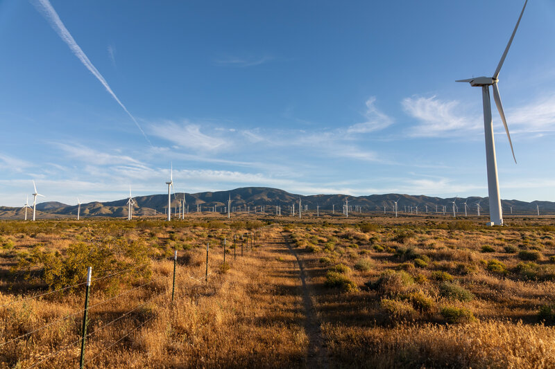 It is a straight line across the wind farm to the Tehachapi Mountains.