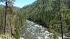 Looking down from a high bluff at the Moose Creek ranger station area, a great view of the Selway River coming from the south, and the pack bridge that crosses it to the Moose Ridge Trail.