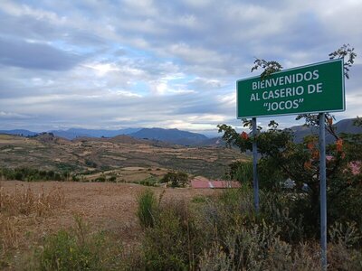 Sign welcoming visitors to the Caserío de Jocos.