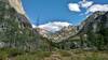 The trail runs along the bottom of the rugged New Fork Canyon with its steep walls reaching to the sky.