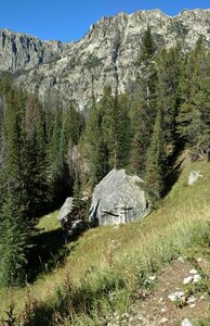 Climbing higher along Reynolds Creek on Palmer Lake Trail, New Fork Canyon walls are seen nearby to the north.