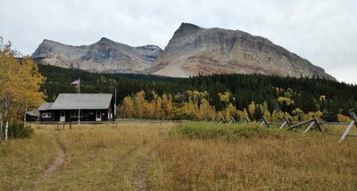Belly River Ranger Station.  Mountains, left to right: Peak 9162 (an outlier of Gable Mountain), Gable Mountain, 9.262 ft., and another prominent peak of the Gable Mountain group (closest)