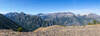 From the Royal Purple Overlook at 8,137 ft, a sweeping panorama opens across the canyon of Royal Purple Creek into the glaciated granite heart of the Eagle Cap Wilderness.